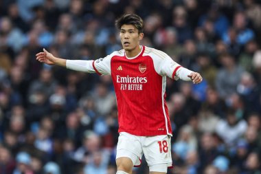 Premier Lig karşılaşmasında Arsenal 'den Takehiro Tomiyasu Manchester City, Manchester Stadyumu' nda Arsenal 'e karşı 31 Mart 202