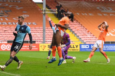 Kylian Kouassi of Blackpool and Jordan Lawrence-Gabriel of Blackpool react to a missed chance on goal during the Sky Bet League 1 match Blackpool vs Wycombe Wanderers at Bloomfield Road, Blackpool, United Kingdom, 1st April 202 clipart