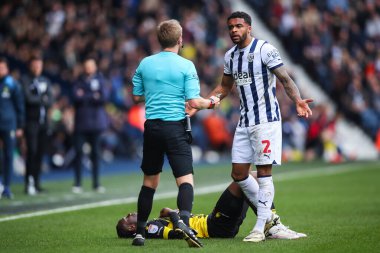 Referee Gavin Ward talks to Darnell Furlong of West Bromwich Albion after a coming together with Vakoun Issouf Bayo of Watford  during the Sky Bet Championship match West Bromwich Albion vs Watford at The Hawthorns, West Bromwich, United Kingdom, 1st clipart