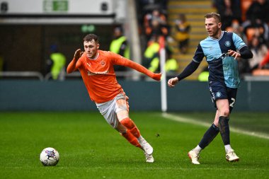Sonny Carey of Blackpool makes a break with the ball during the Sky Bet League 1 match Blackpool vs Wycombe Wanderers at Bloomfield Road, Blackpool, United Kingdom, 1st April 202 clipart