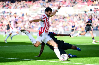 Stoke City 'den Mehdi Lris, Stoke City - Huddersfield Town maçında 1 Nisan 2024' te Bet365 Stadyumu, Stoke-on-Trent 'te karşı karşıya geldi.