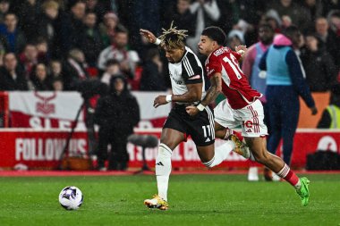 Nottingham Ormanı 'ndan Adama Traor ve Nottingham Ormanı' ndan Morgan Gibbs-White Premier Lig maçı sırasında Nottingham Forest Fulham 'a karşı City Ground, Nottingham, İngiltere' de 2 Nisan 2024 'te oynadılar.