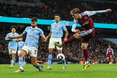 Manchester City 'den Rben Dias, Premier League maçında Manchester City - Aston Villa maçında 3 Nisan 2024' te Etihad Stadyumu 'nda Nicol Zaniolo' dan şutu engelledi.