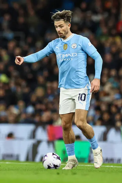 stock image Jack Grealish of Manchester City makes a break with the ball during the Premier League match Manchester City vs Aston Villa at Etihad Stadium, Manchester, United Kingdom, 3rd April 202