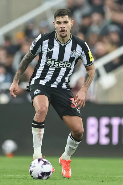 stock image Bruno Guimares of Newcastle United with the ball during the Premier League match Newcastle United vs Everton at St. James's Park, Newcastle, United Kingdom, 2nd April 2024