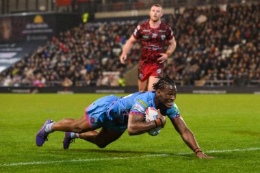 Wigan Warriors 'dan Junior Nsemba, 4 Nisan 202' de Leigh Spor Köyü 'nde oynanan 7. Betfred Süper Lig karşılaşmasında Leigh Leopards' a karşı Wigan Warriors maçına gidiyor.