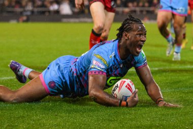 Wigan Warriors 'dan Junior Nsemba, 4 Nisan 202' de Leigh Spor Köyü 'nde oynanan 7. Betfred Süper Lig karşılaşmasında Leigh Leopards' a karşı Wigan Warriors maçına gidiyor.