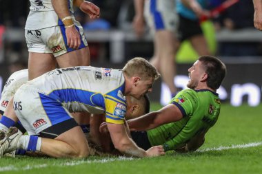 Warrington Wolves takımından Danny Walker, 5 Nisan 202 'de Leeds Gergedan ve Warrington Wolves' a karşı oynanan Betfred Süper Lig karşılaşmasında denemesini kutluyor.