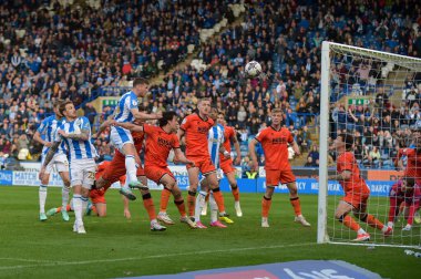 Jaheim Headley of Huddersfield Town scores a goal in  injury time to make the core 1-0 during the Sky Bet Championship match Huddersfield Town vs Millwall at John Smith's Stadium, Huddersfield, United Kingdom, 6th April 2024 clipart