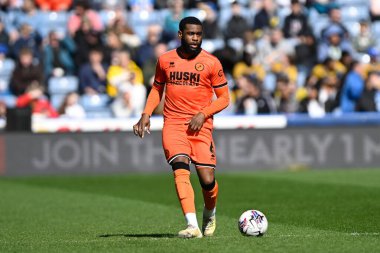 MillWall 'dan Japheth Tanganga, 6 Nisan 2024' te John Smith Stadyumu 'nda Huddersfield Town ile Millwall arasındaki Gökyüzü İddia Şampiyonası karşılaşmasını dört gözle bekliyor.