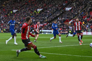 Jayden Bogle of Sheffield United takes a shot on goal during the Premier League match Sheffield United vs Chelsea at Bramall Lane, Sheffield, United Kingdom, 7th April 202 clipart