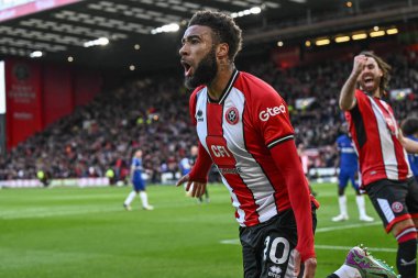 Sheffield United takımından Jayden Bogle, Premier League maçında Sheffield United Chelsea 'ye karşı 7 Nisan 202' de Bramall Lane, Sheffield, İngiltere 'de 1-1' lik galibiyet golünü kutluyor.