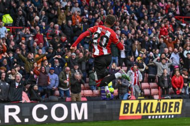 Sheffield United takımından Jayden Bogle, Premier League maçında Sheffield United Chelsea 'ye karşı 7 Nisan 202' de Bramall Lane, Sheffield, İngiltere 'de 1-1' lik galibiyet golünü kutluyor.