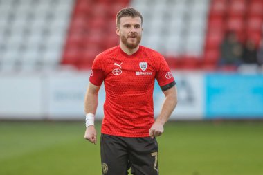 Barnsley 'den Nicky Cadden, 9 Nisan 202' de İngiltere 'nin Stevenage Stevenage Stadyumu' nda oynanan Sky Bet 1 karşılaşmasında maç öncesi ısınma turunda Stevenage ve Barnsley karşı karşıya geldi.