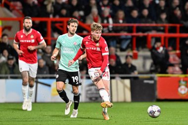 Wrexham 'dan Andy Cannon, 9 Nisan 202' de Wrexham 'a karşı Crawley Town SToK Cae Ras, Wrexham, İngiltere' de oynanan maçta pas attı.