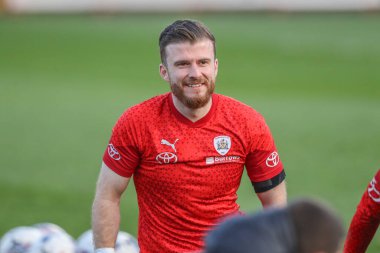 Barnsley 'den Nicky Cadden, 9 Nisan 202' de İngiltere 'nin Stevenage Stevenage Stadyumu' nda oynanan Sky Bet 1 karşılaşmasında maç öncesi ısınma turunda Stevenage ve Barnsley karşı karşıya geldi.