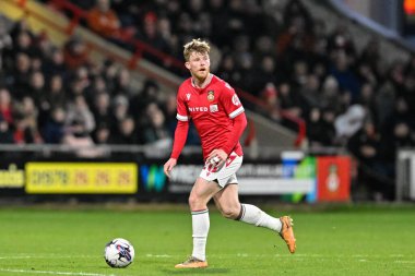 Andy Cannon of Wrexham in action, during the Sky Bet League 2 match Wrexham vs Crawley Town at SToK Cae Ras, Wrexham, United Kingdom, 9th April 202 clipart