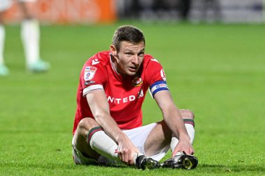 Wrexham 'dan Paul Mullin, 9 Nisan 202' de Wrexham 'ın Crawley Town' a karşı oynadığı Wrexham maçında tepki gösterdi.