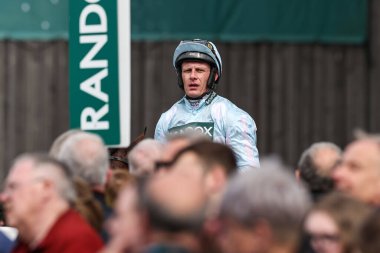 Paul Townend returns to the paddock after finishing second on Kargese in the 2.20pm The Boodles Anniversary 4-y-o Juvenile Hurdle (Class 1) during the Randox Grand National 2024 Opening Day at Aintree Racecourse, Liverpool, United Kingdom, 11th April clipart
