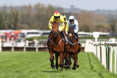 Kalif Du Berlais ridden by Harry Cobden leads the race on the first lapduring the Randox Grand National 2024 Opening Day at Aintree Racecourse, Liverpool, United Kingdom, 11th April 202 clipart
