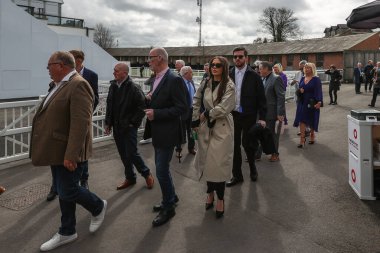 First members of the public arrive ahead of the Randox Grand National 2024 Opening Day at Aintree Racecourse, Liverpool, United Kingdom, 11th April 202 clipart