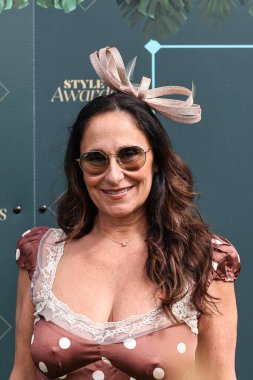 Yarışçılar, Randox Grand National 2024 Kadınlar Günü 'nde İngiltere' nin Liverpool şehrindeki Aintree Hipodromu 'na 12 Nisan 202' de bayanlar gününde geldiler.