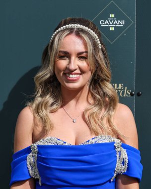 Yarışçılar bayanlar gününde Aintree Yarış Pisti, Liverpool, İngiltere, 12 Nisan 202 'de Randox Grand National 2024 Kadınlar Günü' nde geldiler.