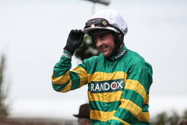 Nico De Boinville celebrates winning the 3.30pm The My Pension Expert Melling Chase (Grade 1) during the The Randox Grand National 2024 Ladies Day at Aintree Racecourse, Liverpool, United Kingdom, 12th April 202 clipart