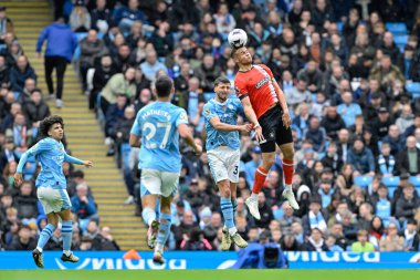 Luton Town 'dan Carlton Morris 13 Nisan 202' de Etihad Stadyumu 'nda oynanan Premier League maçında topun başına geçti.