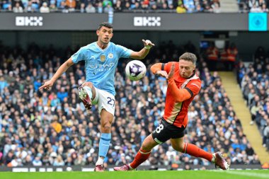 Manchester City 'den Matheus Nunes 13 Nisan 202' de Etihad Stadyumu 'nda oynanan Premier League maçında pas verdi.