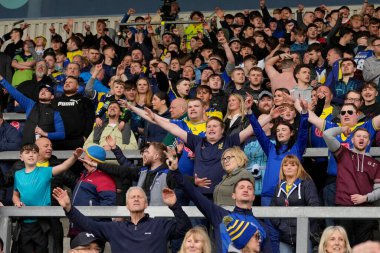 Warrington Wolves taraftarları, 14 Nisan 202 'de St Helens-Warrington Wolves maçında oynanan Betfred Challenge Kupası çeyrek final maçında 8-31' lik galibiyetini kutladı.