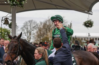 Ciaran Gethnigs celebrates winning the 4.05pm The Randox Supports Race Against Dementia Topham Chase (Grade 3) during the The Randox Grand National 2024 Ladies Day at Aintree Racecourse, Liverpool, United Kingdom, 12th April 202 clipart