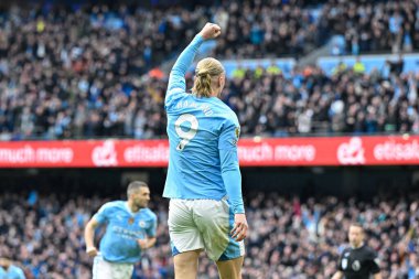 Erling Haaland of Manchester City celebrates his goal to make it 1-0 Manchester City, during the Premier League match Manchester City vs Luton Town at Etihad Stadium, Manchester, United Kingdom, 13th April 202 clipart