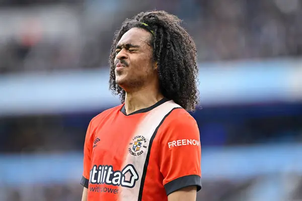 stock image Tahith Chong of Luton Town reacts, during the Premier League match Manchester City vs Luton Town at Etihad Stadium, Manchester, United Kingdom, 13th April 202