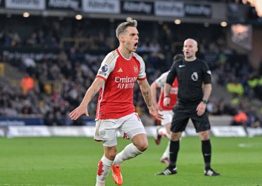 Leandro Trossard of Arsenal celebrates his goal to make it 0-1 Arsenal, during the Premier League match Wolverhampton Wanderers vs Arsenal at Molineux, Wolverhampton, United Kingdom, 20th April 202 clipart