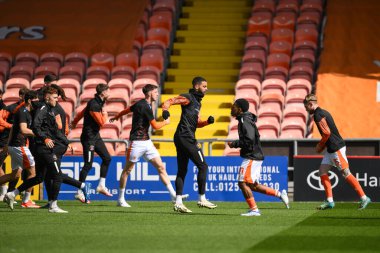 Blackpool oyuncuları, 20 Nisan 202 'de Bloomfield Road, Blackpool' da oynanan Blackpool-Barnsley maçı öncesinde oynanan maç öncesi ısınma maçında...