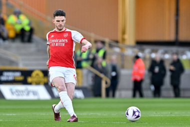 Arsenal 'den Declan Rice, Premier Lig maçında Wolverhampton Wanderers, Molineux, Wolverhampton, İngiltere' de 20 Nisan 202 'de Arsenal maçında pas attı.