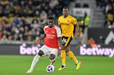 Arsenal 'den Bukayo Saka, Premier Lig maçı sırasında Wolverhampton Wanderers, Molineux, Wolverhampton, İngiltere' de 20 Nisan 202 'de Arsenal' e karşı.