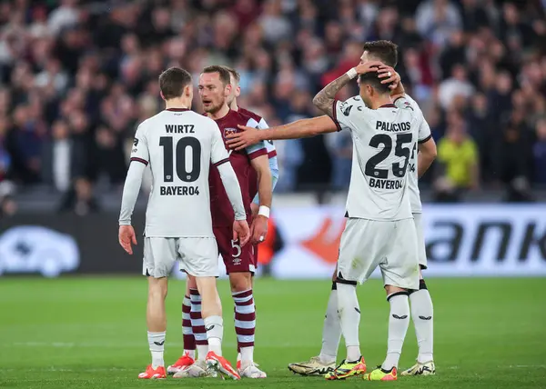 stock image Vladimr Coufal of West Ham United and Florian Wirtz of Bayer Leverkusen clash, during the UEFA Europa League Quarter-Final match West Ham United vs Bayer 04 Leverkusen at London Stadium, London, United Kingdom, 18th April 2024