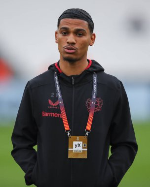 Bayer Leverkusen takımından Amine Adli, UEFA Avrupa Ligi çeyrek final maçında 18 Nisan 202 'de Londra' daki Londra Stadyumu 'nda oynanan Bayer 04 Leverkusen maçında maçı izledi.