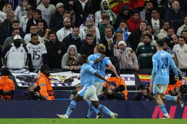 Manchester City 'den Kevin De Bruyne, 17 Nisan 202 tarihinde Etihad Stadyumu' nda oynanan UEFA Şampiyonlar Ligi çeyrek final maçında 1-1 'lik galibiyetini kutluyor.