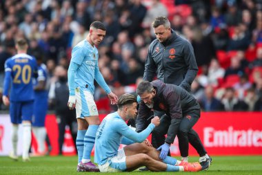 Manchester City 'den Jack Grealish, 20 Nisan 202' de Wembley Stadyumu 'nda oynanan Manchester City - Chelsea maçında tıbbi tedavi gördü.