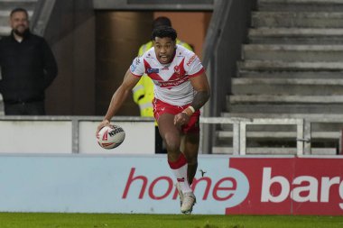 St. Helens 'ten Waqa Blake, 19 Nisan 202' de St Helens - Hull FC maçında Betfred Süper Lig maçında gol atmak için koşuyor.