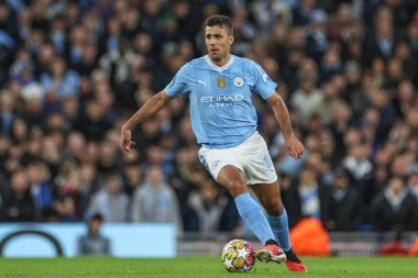 Manchester City 'den Rodri, 17 Nisan 202 tarihinde Etihad Stadyumu' nda oynanan UEFA Şampiyonlar Ligi çeyrek final maçında Real Madrid 'e karşı savaşıyor.