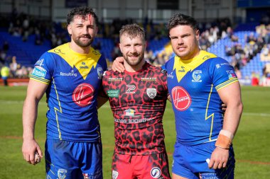 Toby King of Warrington Wolves, Matty Davis of Leigh Leopards and Joe Philbin of Warrington Wolves pose for a photo after the Betfred Super League Round 8 match Warrington Wolves vs Leigh Leopards at Halliwell Jones Stadium, Warrington, United Kingdo clipart
