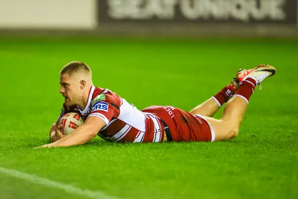 stock image Ryan Hampshire of Wigan Warriors scores a try during the Betfred Super League Round 8 match Wigan Warriors vs Castleford Tigers at DW Stadium, Wigan, United Kingdom, 19th April 202