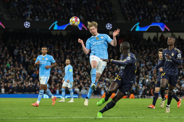 Kevin De Bruyne of Manchester City heads the ball during the UEFA Champions League Quarter Final Manchester City vs Real Madrid at Etihad Stadium, Manchester, United Kingdom, 17th April 202