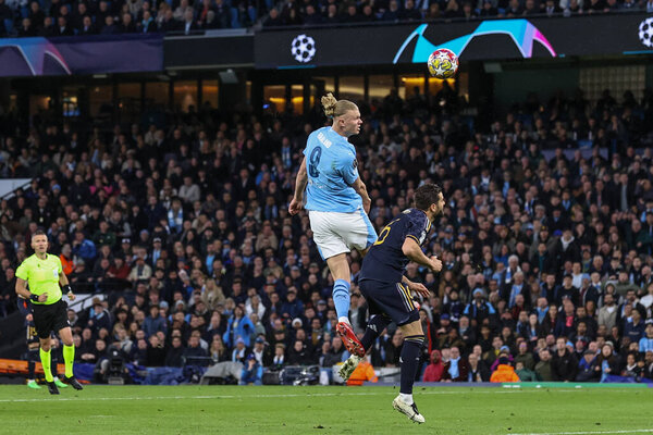 Erling Haaland of Manchester City heads on goal during the UEFA Champions League Quarter Final Manchester City vs Real Madrid at Etihad Stadium, Manchester, United Kingdom, 17th April 202