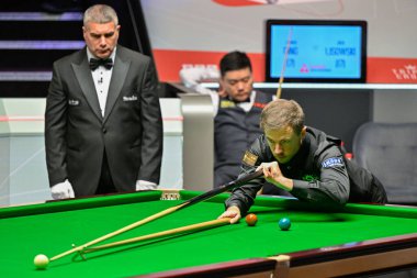 Jack Lisowski takes a shot, during the Cazoo World Championships 2024 at Crucible Theatre, Sheffield, United Kingdom, 24th April 2024 clipart