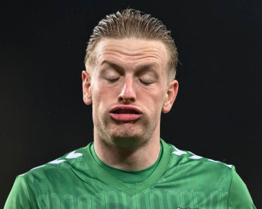 Everton 'dan Jordan Pickford, 24 Nisan 202' de Goodison Park, Liverpool 'da oynanan Premier League maçı sırasında dudaklarını büzüyor.
